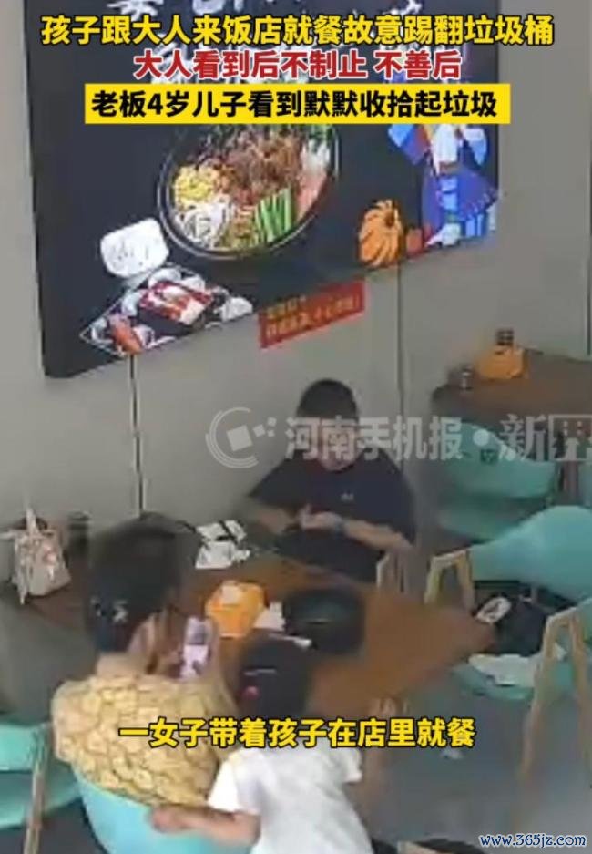 女孩故意踢翻垃圾桶4岁男孩默默收拾